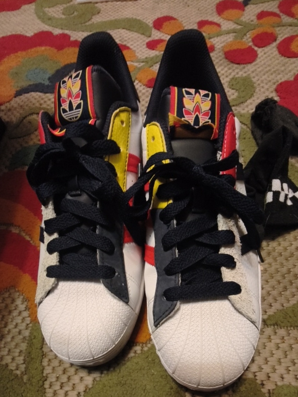 adidas White Sneakers with Black, Red & Yellow Accents